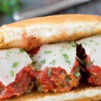 Meatball Sandwich · Homemade meatballs and marinara sauce, topped with melted provolone cheese, stuffed and bake...