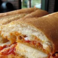 Italian Breaded Chicken · Five oz. breaded chicken breast and homemade marinara sauce, topped with melted provolone ch...
