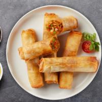 Crispy Spring Roll · Deep-fried homemade vegetarian spring rolls. Served with our homemade sweet-chili sauce.