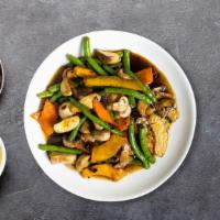 Vegetable Lover Special · Stir-fried mixed vegetables, mushrooms, and garlic in our house stir-fry brown sauce. Served...