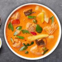 Panang Curry · Bell peppers, Thai basil leaves, carrots, peas, zucchini, and broccoli cooked in a mild pana...