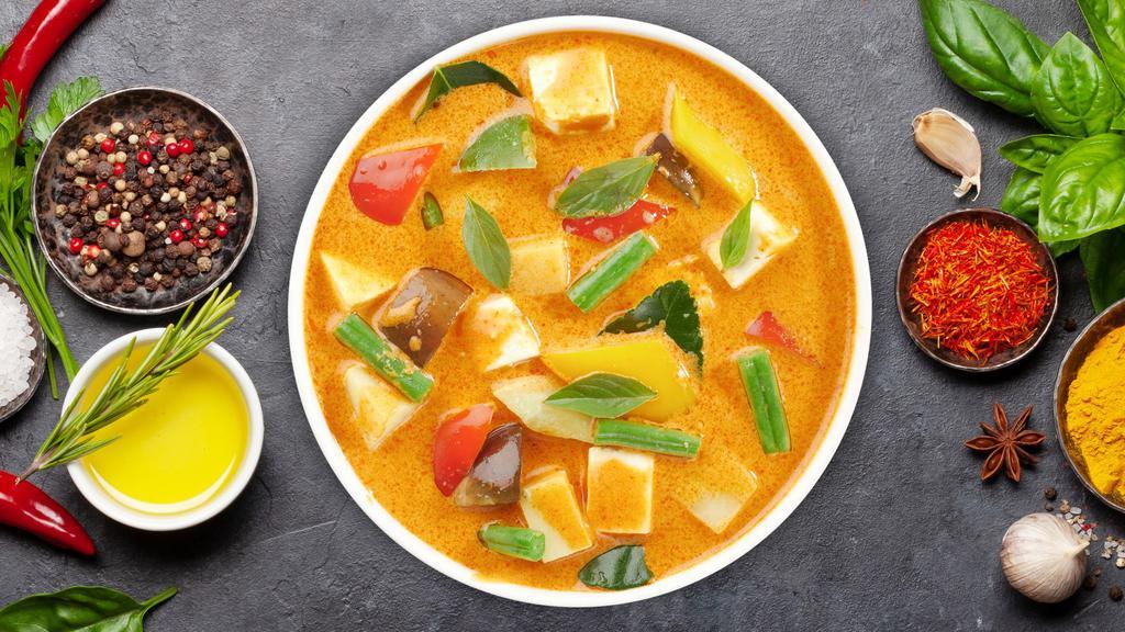 Yellow Curry · Bell peppers, Thai basil leaves, carrots, peas, zucchini, and broccoli cooked in a mild Panang curry sauce. Choice of style.