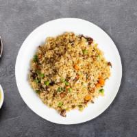 Combination Fried Rice · A meat combination of Chinese BBQ pork, beef, and chicken stir-fried with rice, egg, collard...