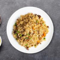 Bbq Pork Fried Rice · Stir-fried rice with sliced Chinese BBQ pork, egg, carrots, peas, onions, and collard greens...