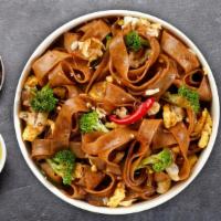 Beef Chow Fun · Pan-fried flat rice noodles, tender beef, shitake mushrooms, bean sprouts and green onions i...