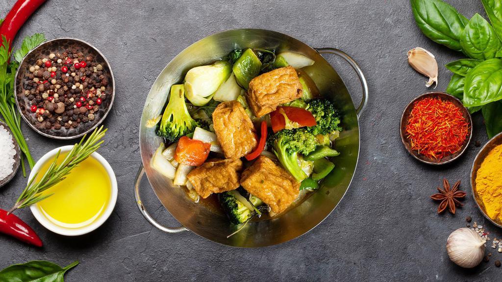 Vegan Vegetable Lover · Stir-fried mixed vegetables, mushrooms, and garlic in our house stir-fry brown sauce with your choice of fried tofu or steamed tofu or extra veggies. Served with jasmine white rice or brown rice.