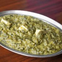 Palak Paneer/Palak Aloo · Specialty of punjab, fresh spinach cooked curry style with cheese cubes or potatoes and seas...