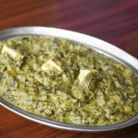 Saag · A true dish of Punjab, spinach leaved cooked curry style, seasoned with fresh herbs and spic...