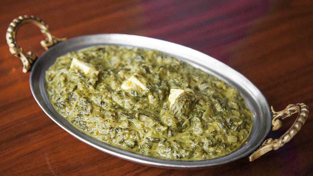 Saag · A true dish of Punjab, spinach leaved cooked curry style, seasoned with fresh herbs and spices.