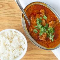 Lamb Rogan Josh · A dish from Kashmir, cooked with a gravy based on browned onions, yogurt, garlic, ginger and...