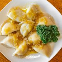 Homemade Pierogi · Polish dumplings made in house, filled with your choice of cheese and potato, seasoned groun...