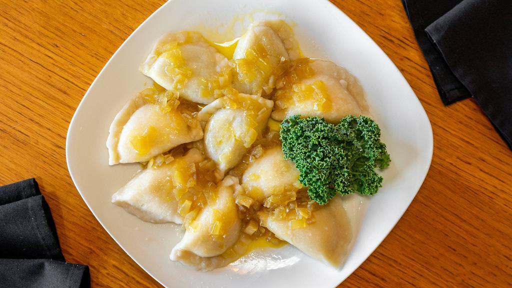 Homemade Pierogi · Polish dumplings made in house, filled with your choice of cheese and potato, seasoned ground pork, or sauerkraut and mushroom.