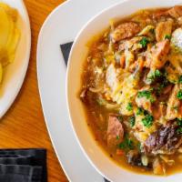 Bigos · Polish hunter stew, a savory blend of sauerkraut, sweet cabbage, slow cooked pork, mushrooms...