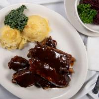 Zeberka · Fall off the bone pork ribs, marinated, smothered in our homemade BBQ sauce, and served with...