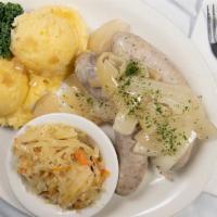 White Pork Sausage · Poached polish sausage, made in house, topped with caramelized onions. Served with your choi...