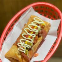 Mummy Dogo (Momia Dogo) · Hotdog stuffed with mozzarella cheese, then wrapped in a freshly made flour tortilla and bac...