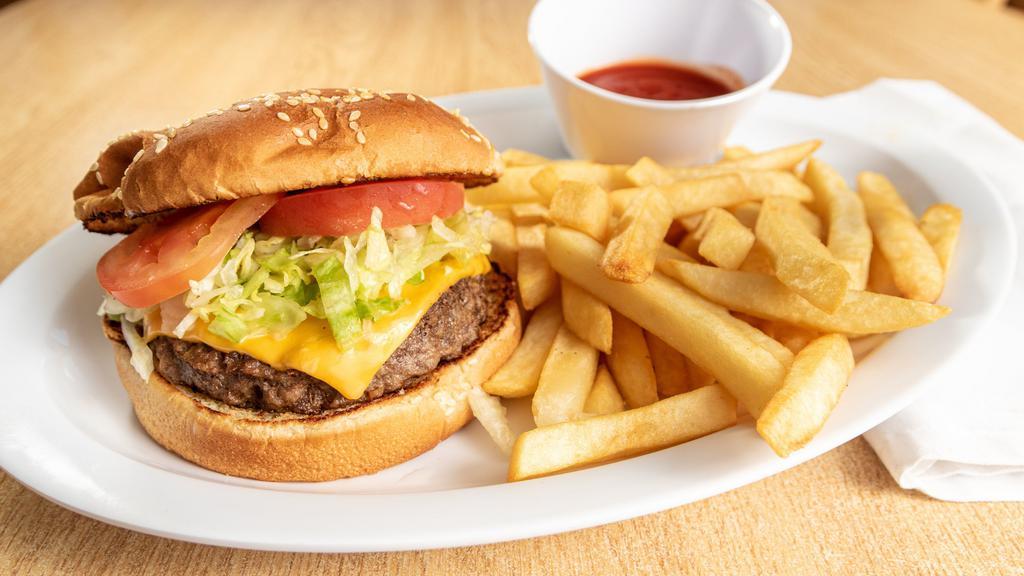 The Classic Hamburger  · comes with cheese , tomato , lettuce , mustard, mayo and ketchup