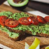 Toast · Two slices of our toasted vegan and organic whole-wheat bread topped with avocado and one to...