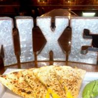 Chicken Quesadilla · Grilled chicken and American cheese melted in flour tortilla served with sour cream and guac...