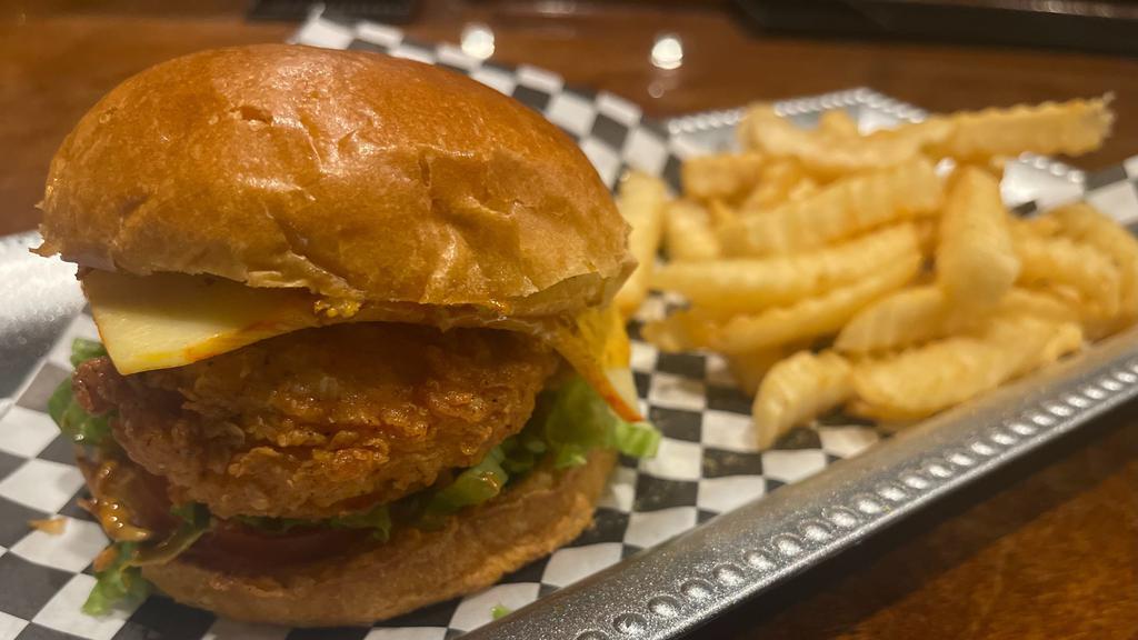 Mixer Chicken Sandwich · Fried Juicy Chicken on a buttered brioche bun with our famous Hollywood Sauce served with french fries