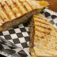 Turkey Quesadilla Burger · Juicy Turkey burger made like a quesadilla with our famous Hollywood Sauce