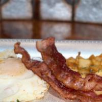 2 Egg Breakfast Special · Eggs, bacon or sausage, potatoes and toast.