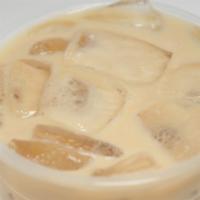 Iced Coffee · Non diary creamer and simple syrup included.