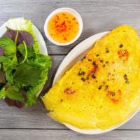 Vietnamese Crispy Pancake - Bánh Xèo  · Ground pork, shrimp, bean sprouts, served with vegetable and fish sauce.
