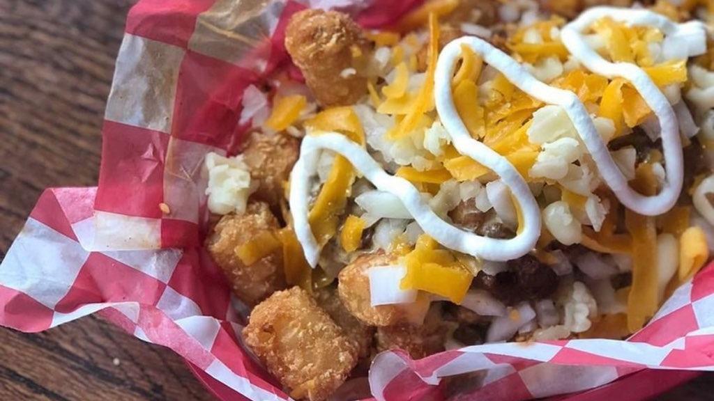 Youbetcha Basket · Choice of tots or fries, topped with red chili, cheddar fondue, shredded cheese, diced onions and side of sour cream