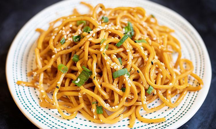 Sesame Noodles · (vegan, dairy-free) Noodles, soy sauce, sugar, garlic, ginger, red chili flakes, scallions, sesame seeds, and sesame oil