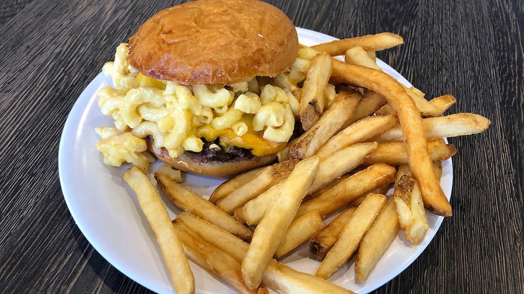 Mac Down Burger · Mac and Cheese, Boursin, Cheddar and Swiss Cheese.