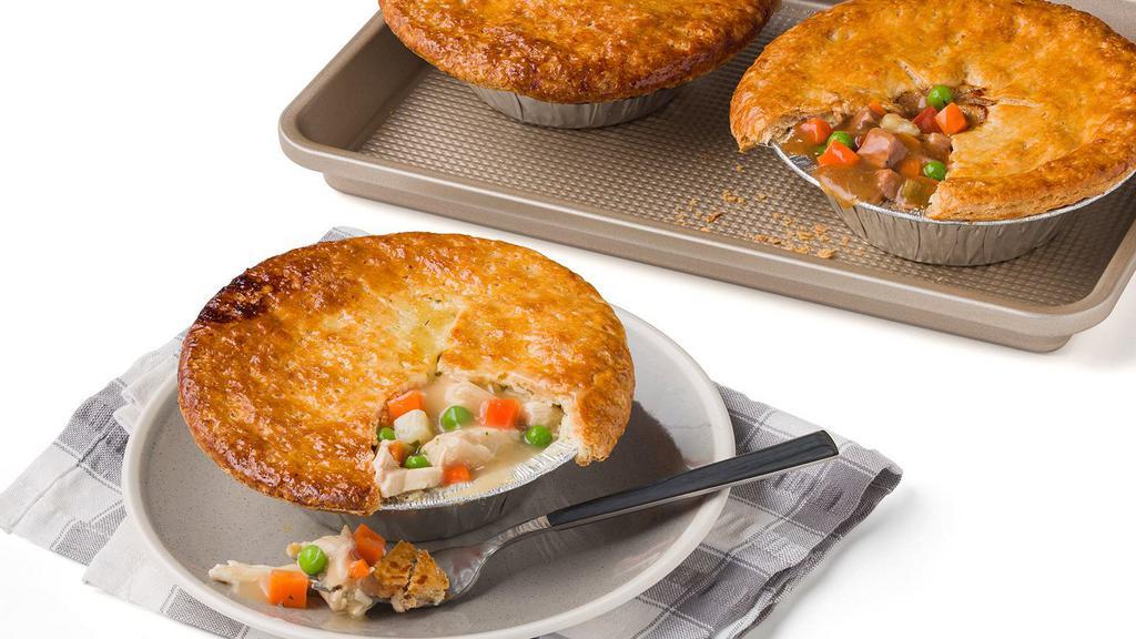 Chicken Pot Pie · 16oz. Hand-Shredded Rotisserie Chicken, Potatoes, Carrots, Peas, Onions and Celery in a Savory Chicken Broth-Based Sauce and Topped with a Flakey Crusted Dough .