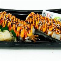 Temptation Roll (10 Pc) · Tempura style shrimp, avocado, cucumber rolled in sushi rice and seaweed. Topped with shredd...