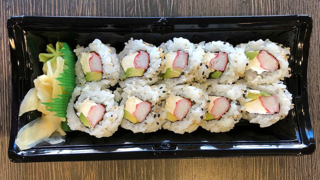 Philadelphia Roll · 10pc. Crab Stick, Avocado & Cream Cheese rolled in Seaweed with Sushi Rice and Sesame Seeds.