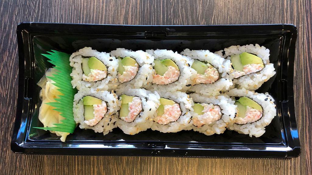 California Roll With Crab Salad · Imitation Crab with Cucumber and Avocado rolled in Seaweed with Sushi Rice. Coated with Sesame Seeds.