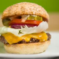 Cheeseburger · 1/3LB Hand-Made Lean USDA Beef, cheddar cheese, crisp lettuce, red ripe tomato slice, sliced...