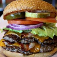 Double Cheeseburger · Two 1/3LB Hand-Made Lean USDA Beef, cheddar cheese, crisp lettuce, red ripe tomato slice, sl...