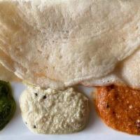 Dosa · South Indian crepe made from rice and bean, with chutneys - tomato, cilantro, coconut - and ...