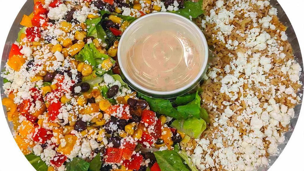 Mexicana Bowl · Romaine, Basmati Rice, Black Bean Corn Salsa, Feta, Red and Yellow Peppers, Chipotle Ranch Dressing