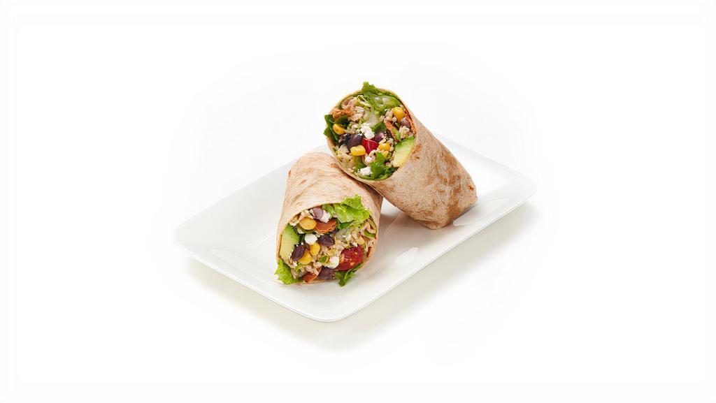 Rancho Mirage Wrap · Romaine, basmati rice, black bean corn salsa, grape tomatoes, crushed pita chips, feta, cilantro, avocado & chipotle ranch dressing