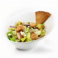 Chopped Signature · Romaine, sun-dried cranberries, roasted pecans, red onions, feta, croutons with chopped bals...