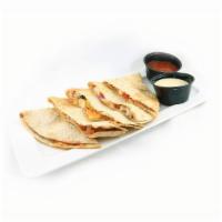 Bbq Chicken Quesadilla · Grilled chicken, banana peppers, cheddar, red onions, mushrooms & BBQ sauce.