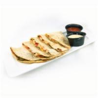 Pesto Quesadilla · Grilled chicken, red and yellow peppers, cheddar & pesto.