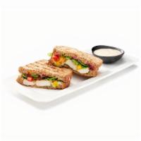 Cranberry Pesto Sandwich · Grilled chicken, cranberry sauce, pesto, red and yellow peppers, cheddar, mozzarella and rom...