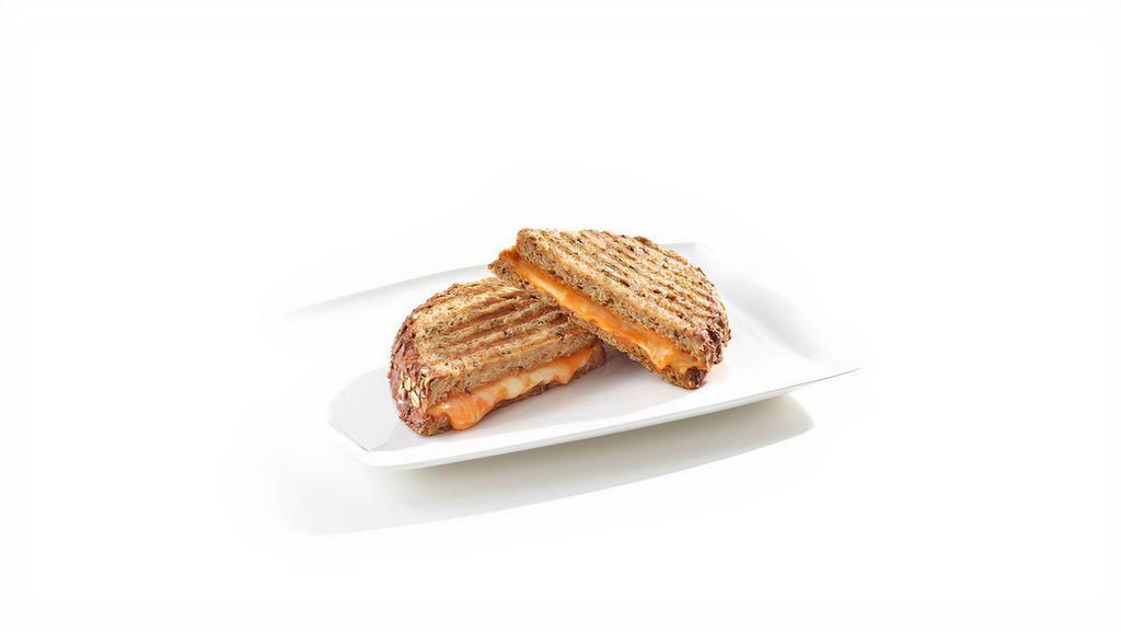 Grilled Cheese · Your choice of multigrain or sourdough grilled cheese, served with ketchup on the side.