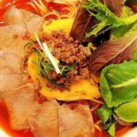 Volcano Soup Ramen 火山面 · Spicy. Spicy and creamy soup noodles. The soup based on sesame sauce and premium Sichuan chi...