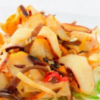 Squid Salad鱿鱼沙拉 · Diced squid, seasoned and topped with sesame seeds