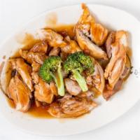 Teriyaki Chicken · Dark meat chicken chopped in pieces topped with homemade teriyaki sauce.
