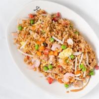 House Fried Rice · A combination of Shrimp,Chicken,Pork,
Bean Sprout and Peas and Carrots with a little bit of ...