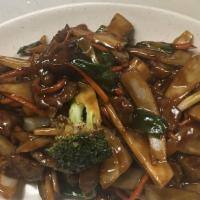 Mongolian Beef · Sautéed beef stir fry with white onion, green onion, bell peppers, carrots, carrots, bamboo ...